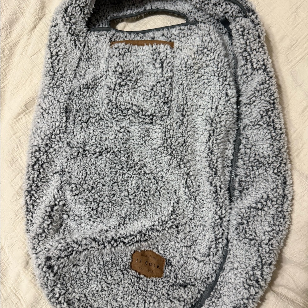 Stroller/car seat bundle me winter cover. Never used.